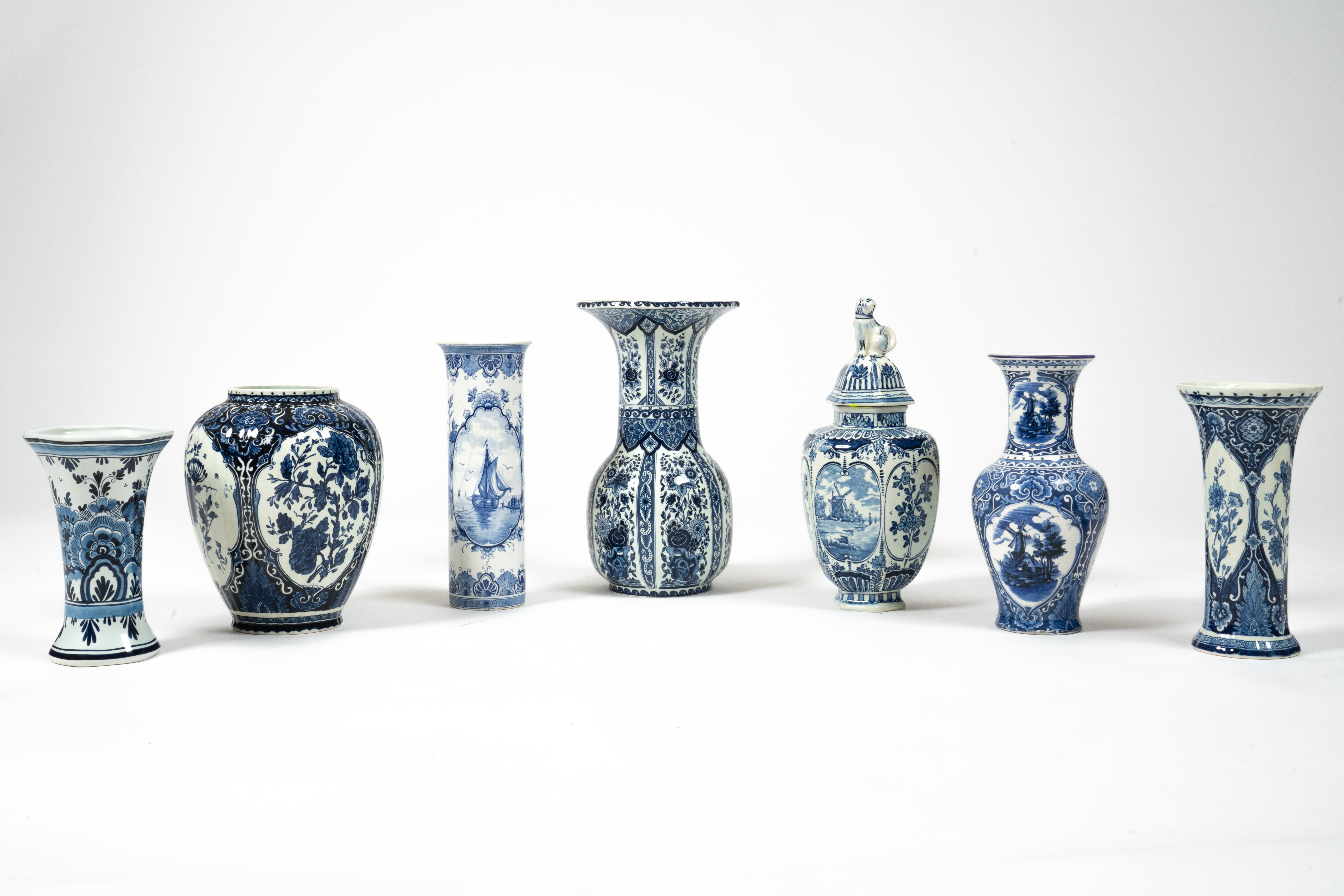 Vintage 7-piece vases set made of blue and white porcelain